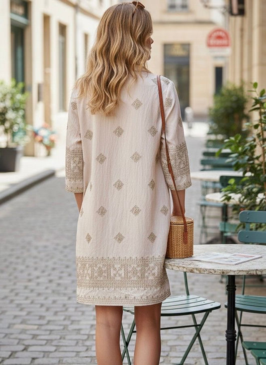 Jurk borduursels crème