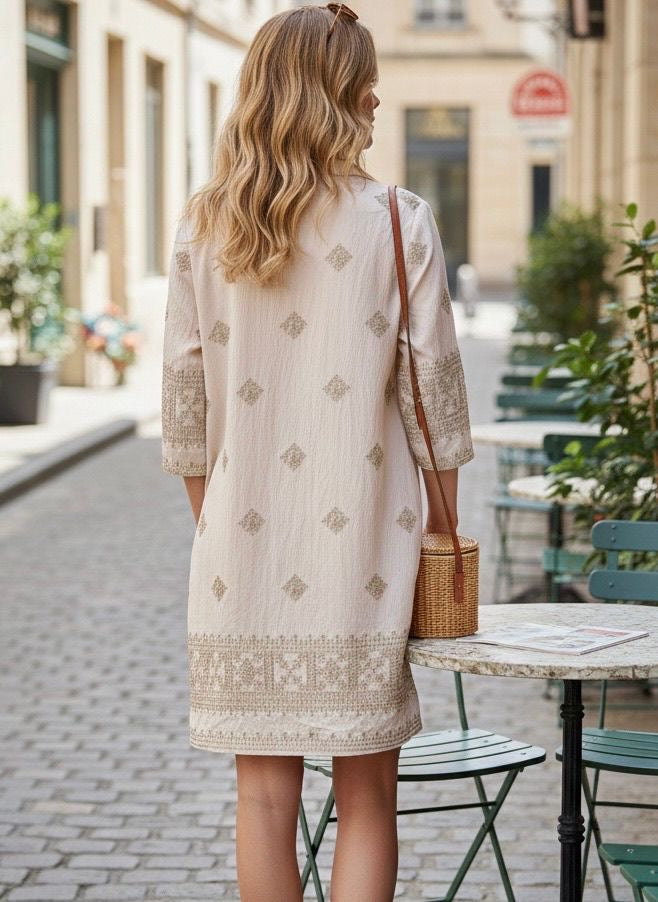 Jurk borduursels crème