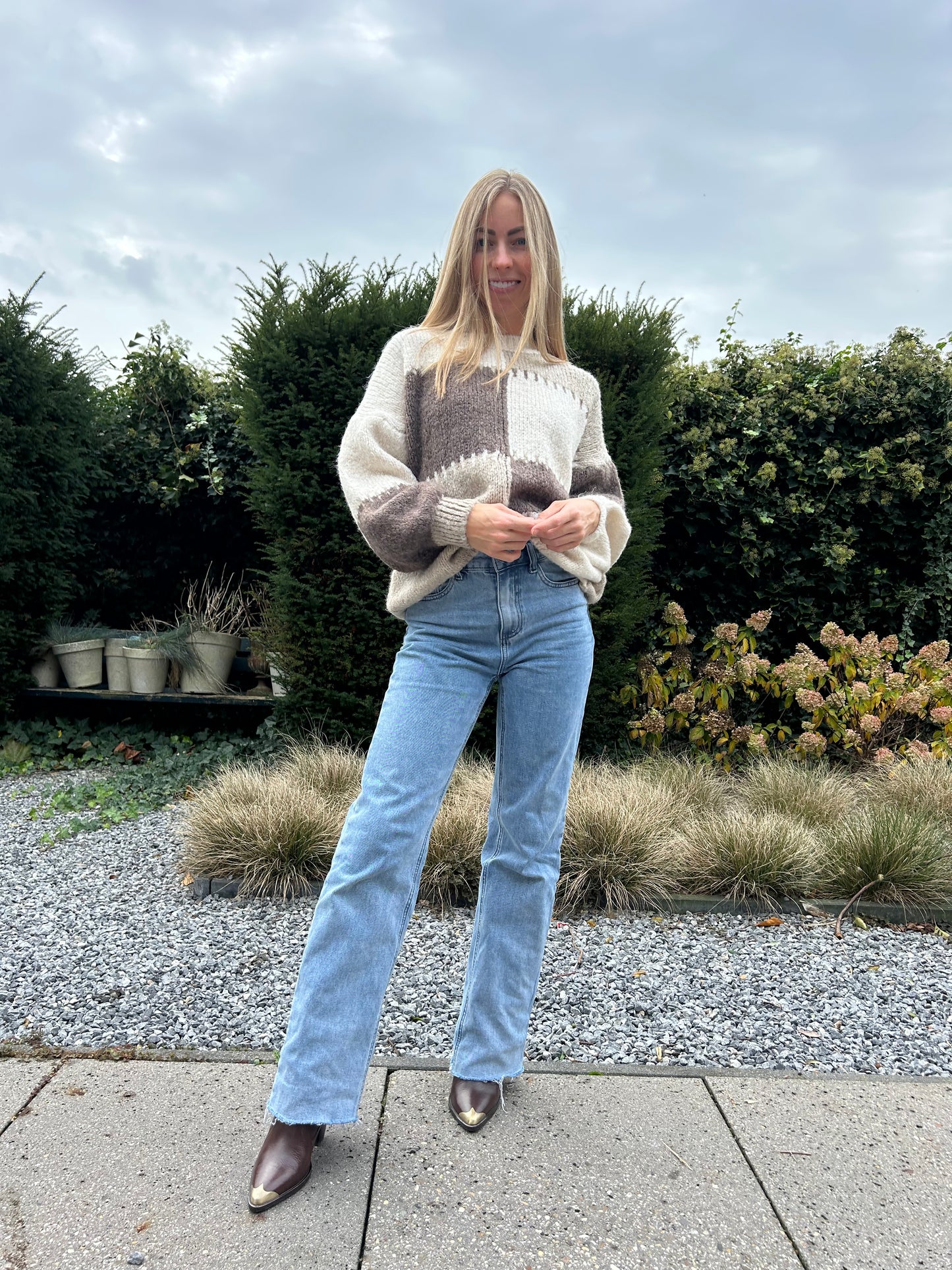 Garçonne trui grote ruit taupe